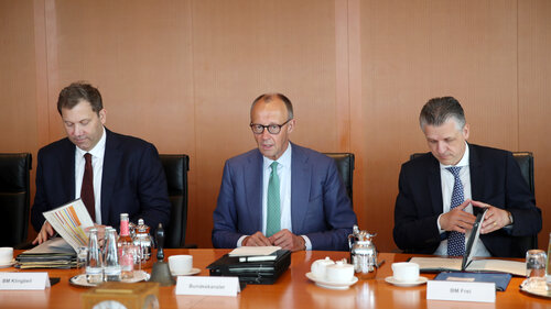 BERLIN, GERMANY - JUNE 10: German Chancellor Friedrich Merz (C) and Vice Chancellor and Finance Minister Lars Klingbeil (L), Federal Minister for Special Affairs and Head of the Chancellery Thorsten Frei (R), attend the weekly federal government cabinet meeting on June 10, 2026 in Berlin, Germany. The cabinet is meeting as public discontent with the performance record of the governing coalition is growing. (Photo by Maryam Majd/Getty Images)
